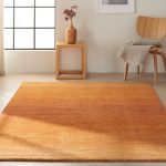 Calvin Klein Cumin Linear Glow Rug Orange
