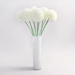 Pack of 12 Cream Pom Poms Yellow